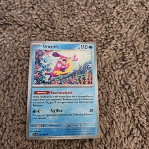 Bruxish 049/191 Sv08: Surging Sparks Reverse Holo